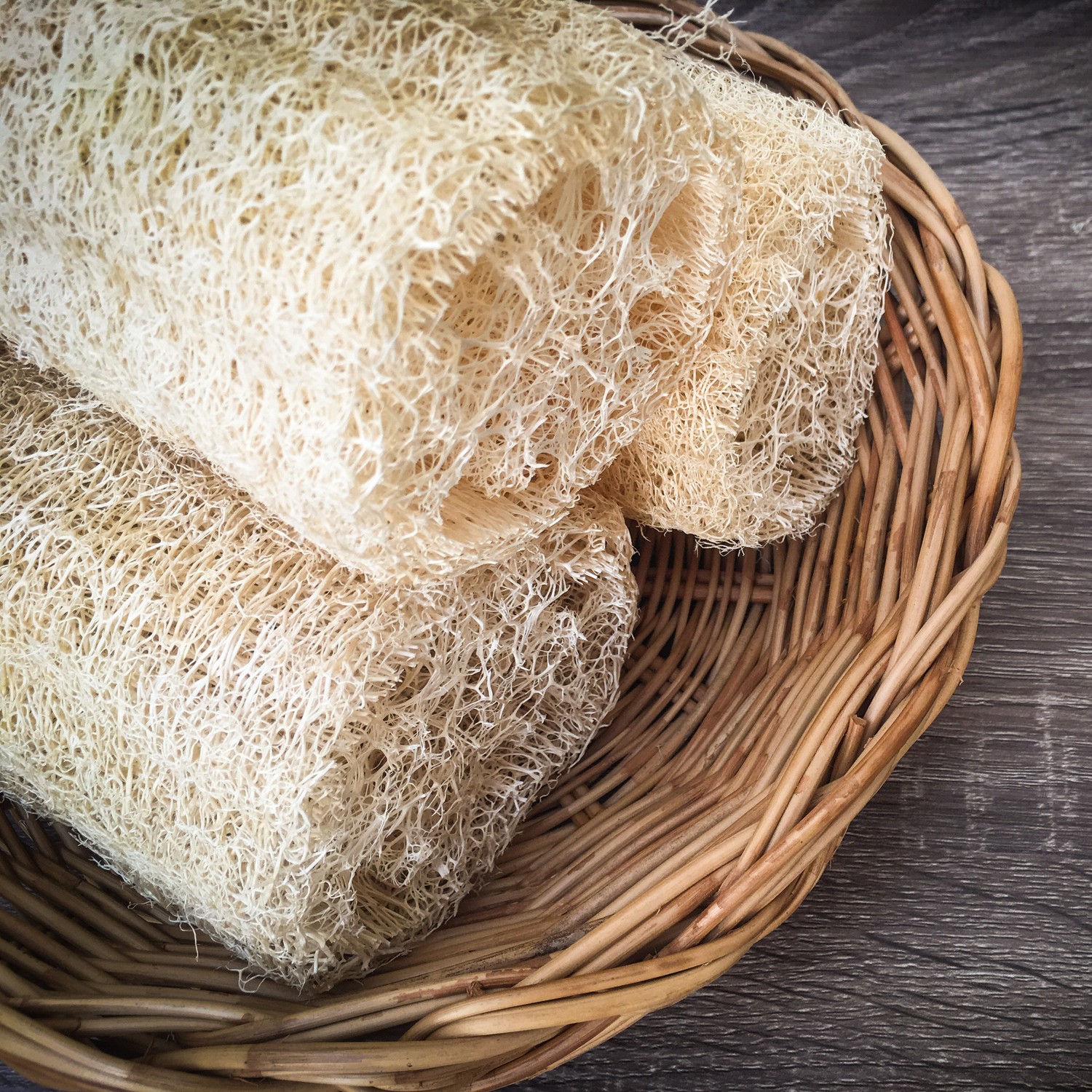 Natural Luffa Sponge harvested and on a basket in a bathroom