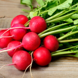 Radishes on wooden table