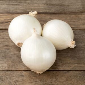 White Snowball Onions on a wooden surface